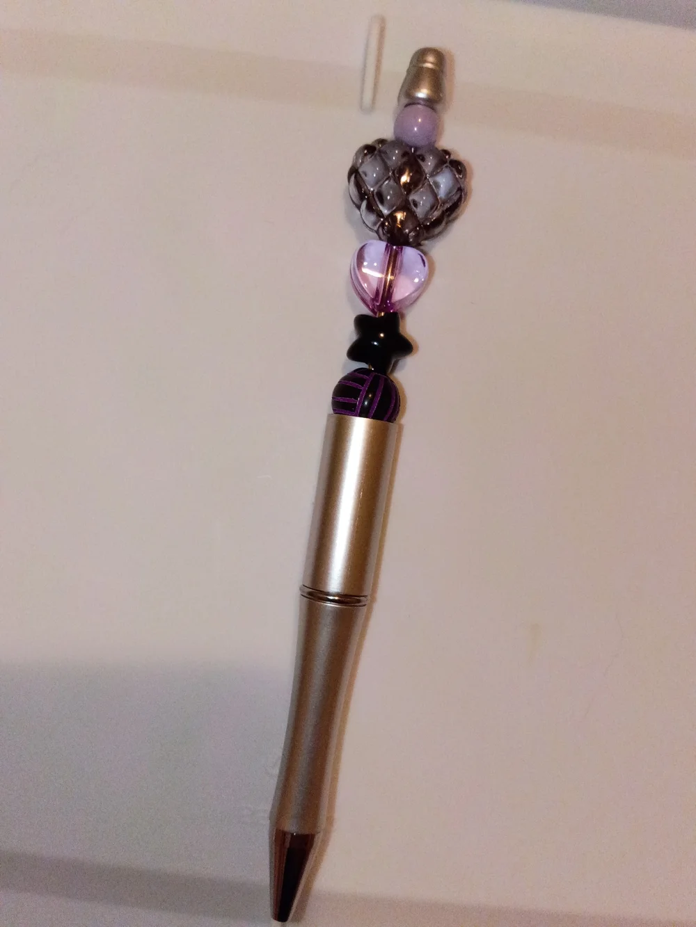 Gold-Tone Pen with Lavender and Black Beaded Charm